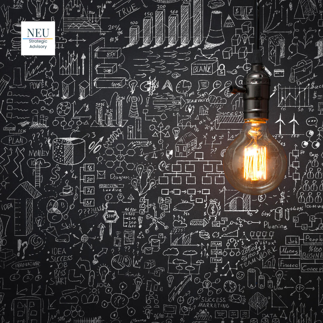 neu-strategic-advisory-marketing-agency-creative-strategy An image for a marketing agency's "lightbulb" marketing strategy, showing a clear lightbulb on the right side of the image and a blackboard with white chalk drawings.